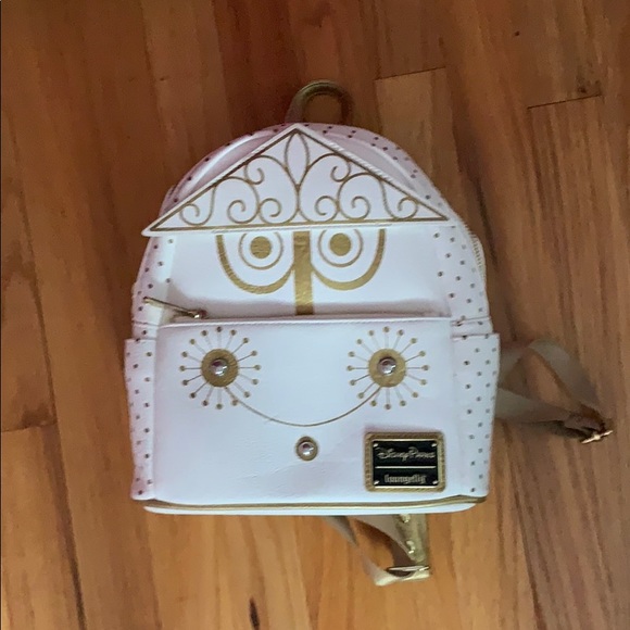 small world mini backpack